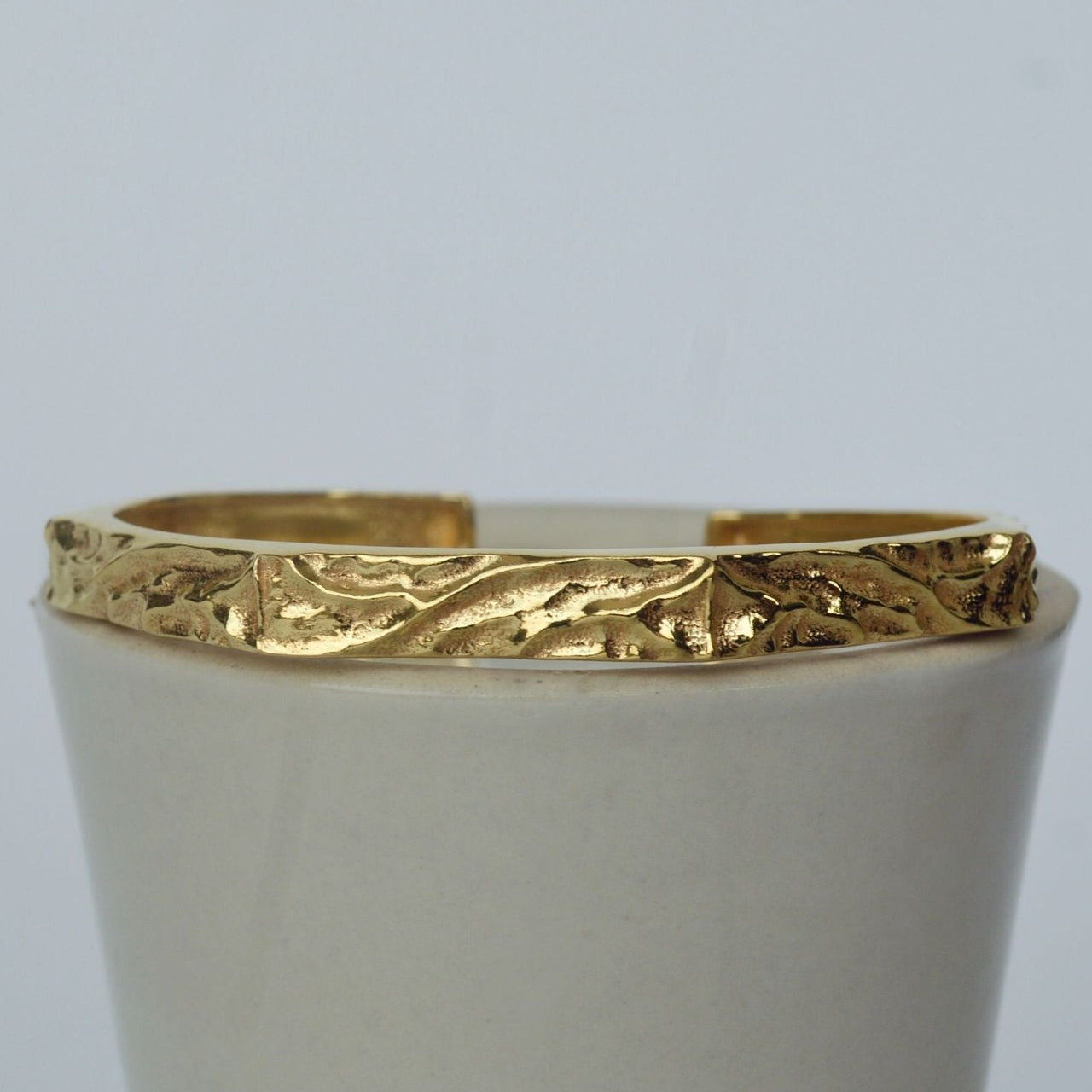 bangle type bracelet gold